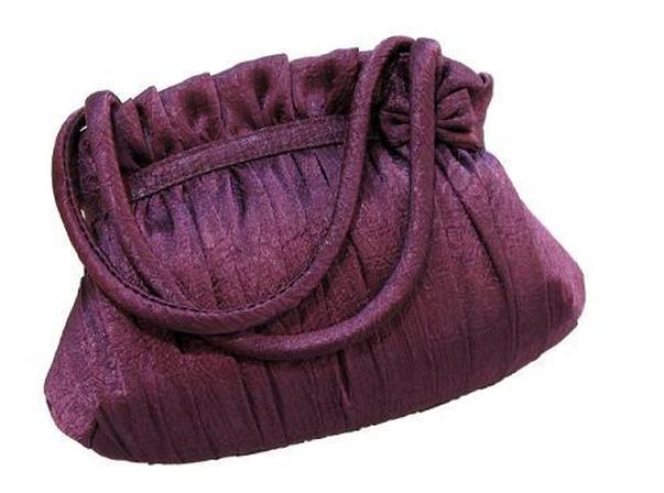 https://cf.ltkcdn.net/handbags/images/slide/38694-603x448-Eggplant-Bag.jpg