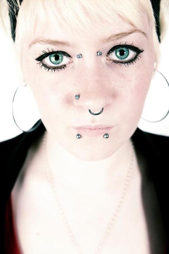 https://cf.ltkcdn.net/tattoos/images/slide/158496-566x848r1-stud-and-septum.jpg