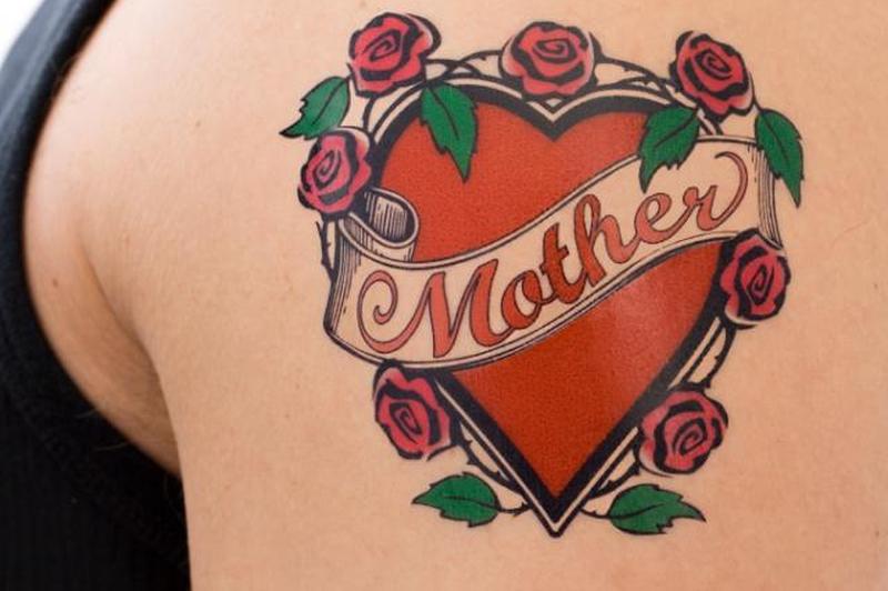 https://cf.ltkcdn.net/tattoos/images/slide/158355-849x565r1-Mother-heart-tat.jpg