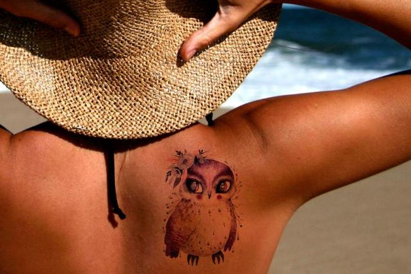 Фото татуировки сова акварелью